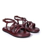 Sandalia plana vinotinto modelo Nara de Zuoro Shoes, con tiras tubulares acolchadas en un tono borgoña profundo y elegante