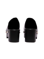 Vista posterior de la plataforma Tabata, resaltando la altura imponente de la suela y el acabado limpio del talón abierto