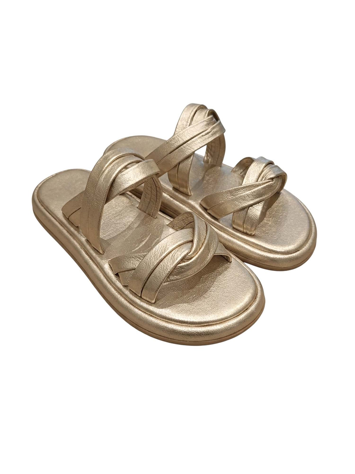Sandalia de plataforma flatform modelo Seda de Zuoro Shoes en color dorado, con correas de cuero suavemente entrelazadas sobre el empeine