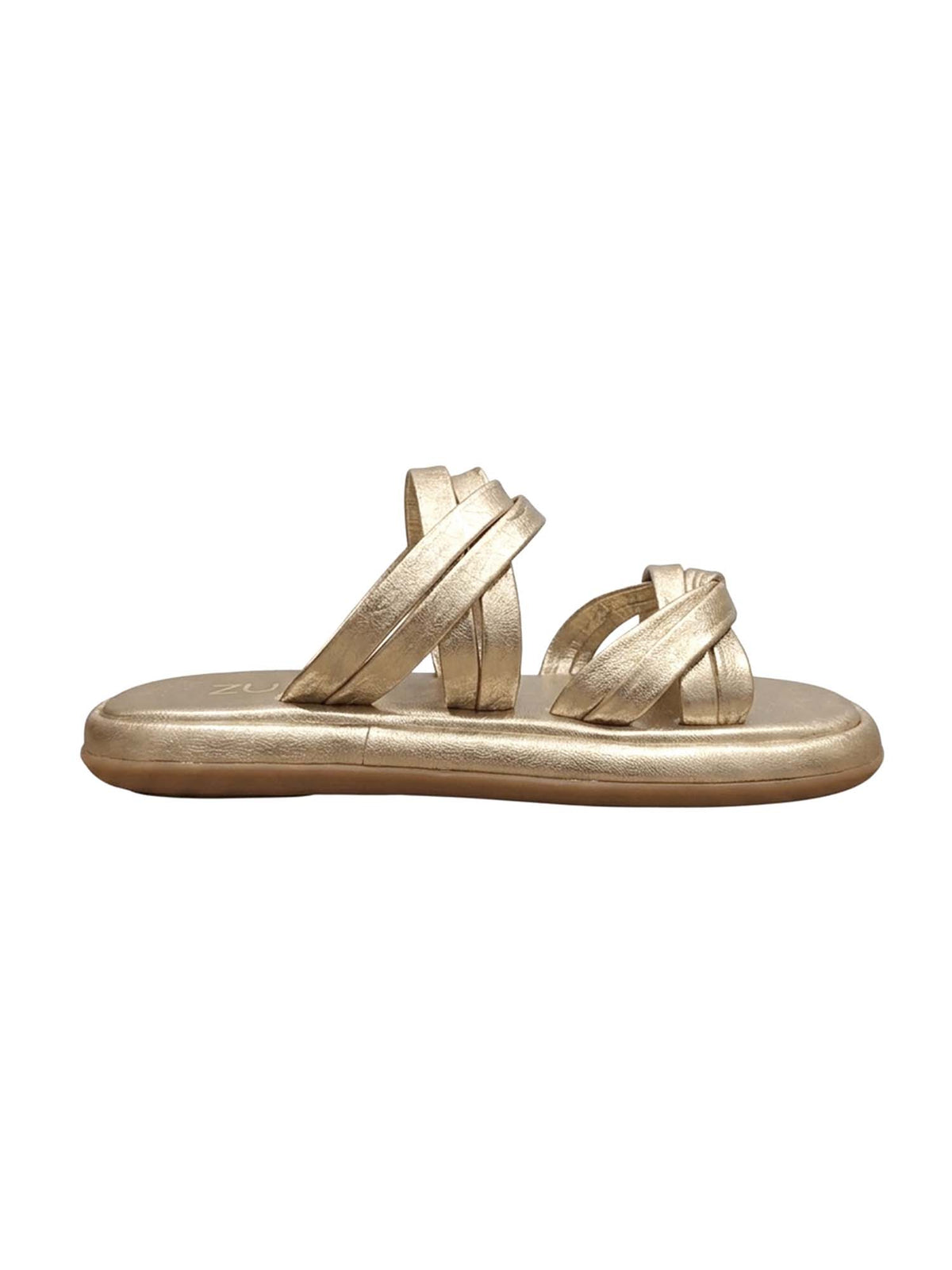 Perfil de la sandalia flatform Seda en tono dorado, resaltando el efecto fluido de las correas entrelazadas y el borde redondeado de la suela